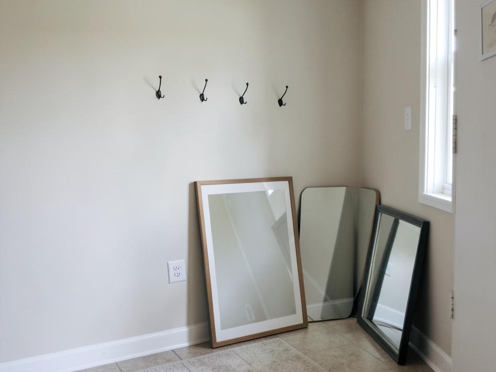 Gallery wall, laser-leveled before